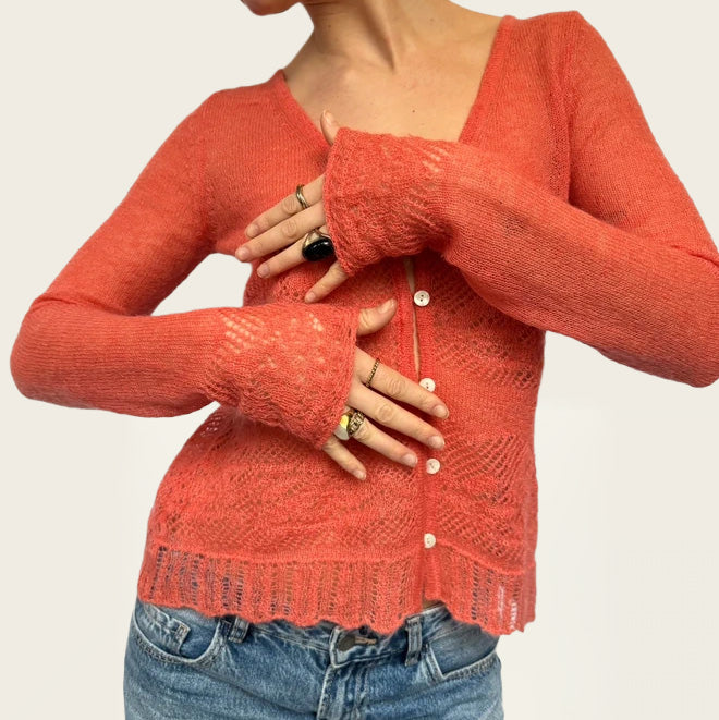 Vest in een zachte koraaltint